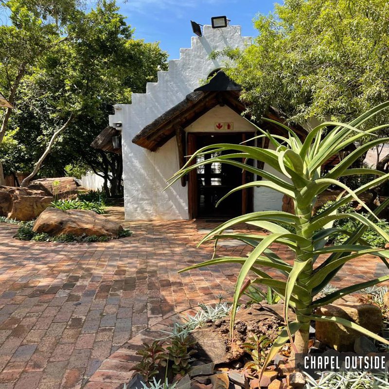 The Chapel entrance from the brick-paved garden courtyard